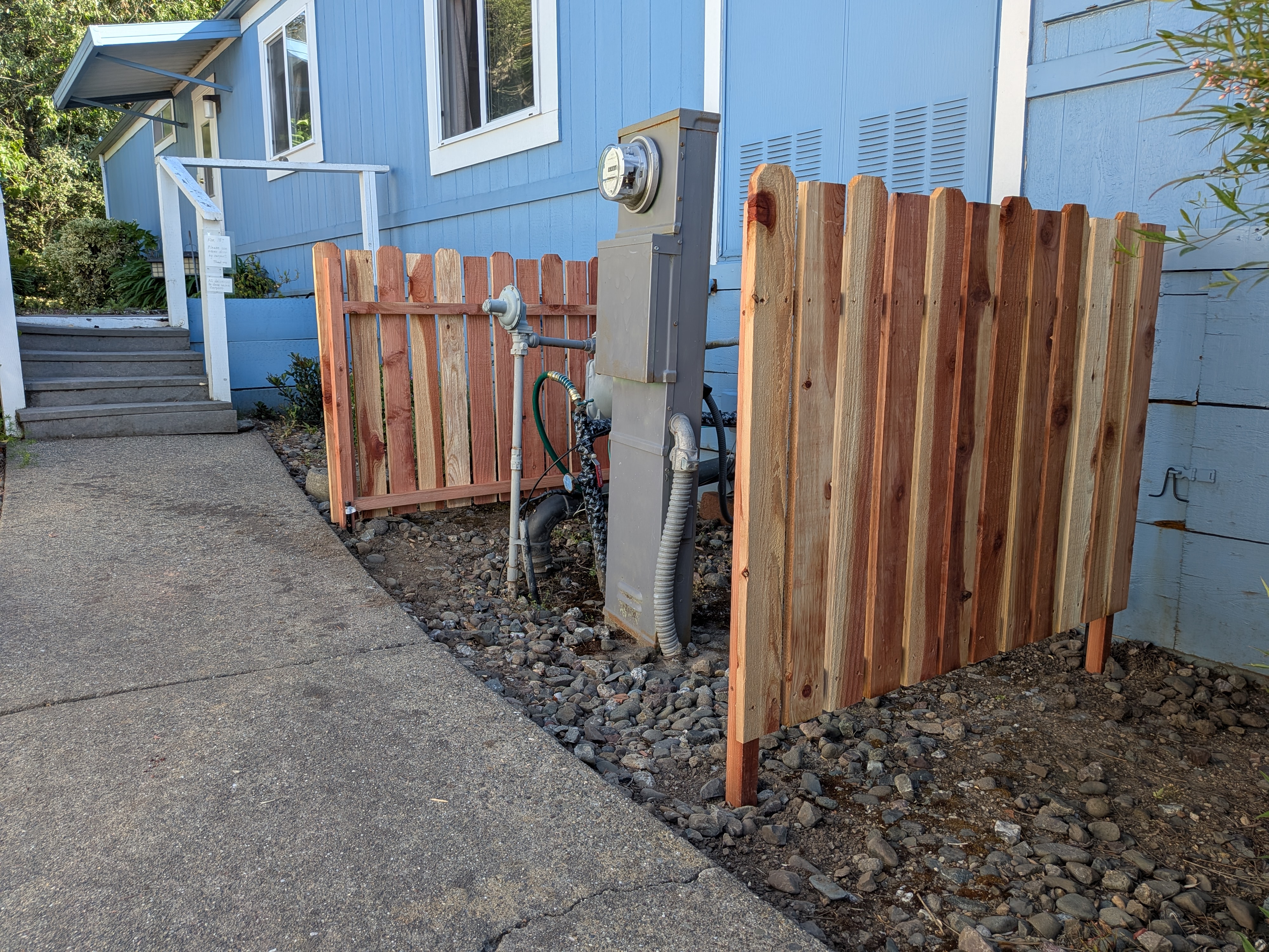 Privacy fencing around electrical panel and equipment - Progress image